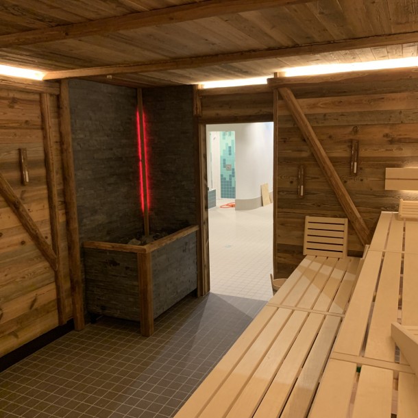 bild7 sauna old wood stove sauna bench lighting wellness facility construction aqua fun kirchlengern fire ice sauna group